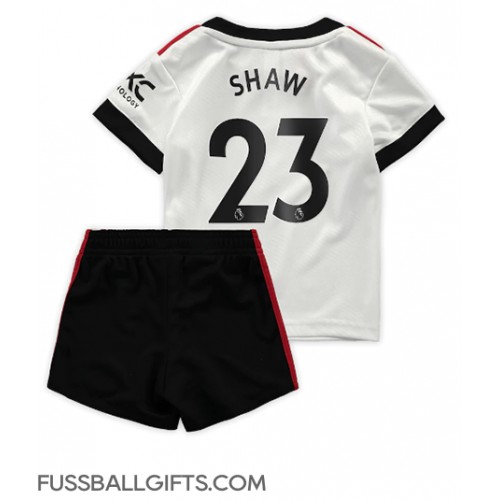 Manchester United Luke Shaw #23 Fußballbekleidung Auswärtstrikot Kinder 2022-23 Kurzarm (+ kurze hosen)